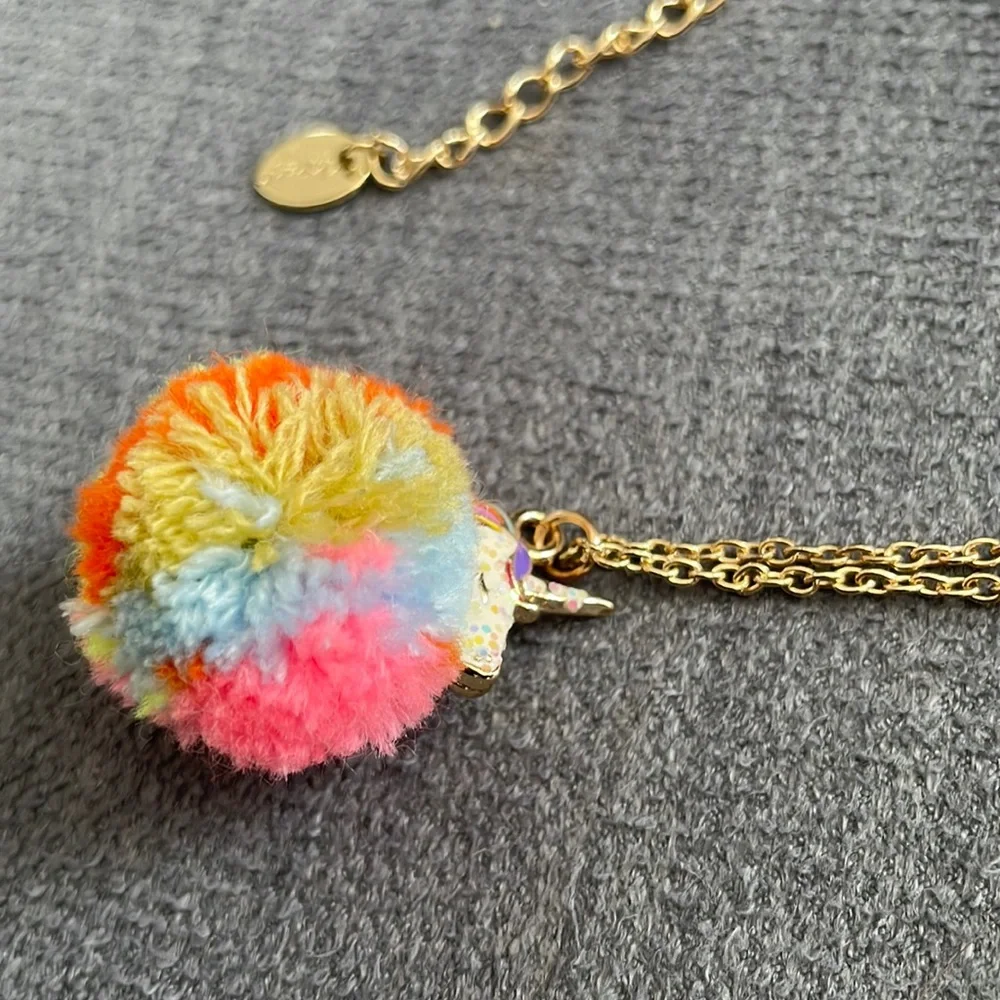 Claire’s Rainbow Unicorn PomPom Necklace